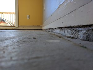 Uneven floor basement slab sloping