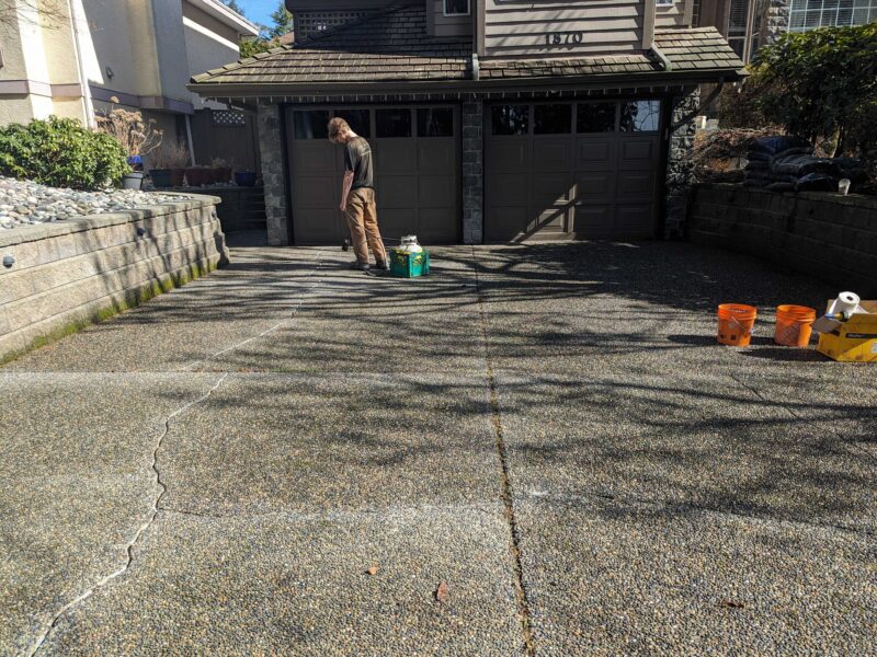 driveway being repaired by crew