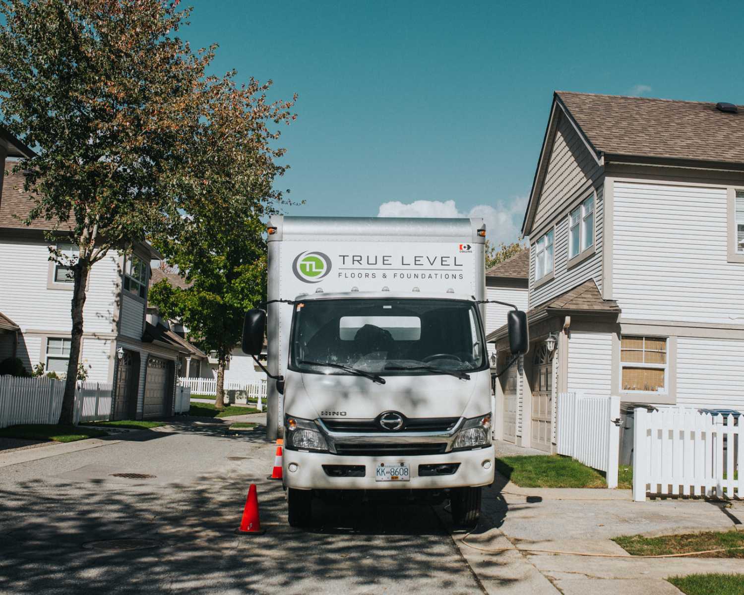 who we help truck in front of strata