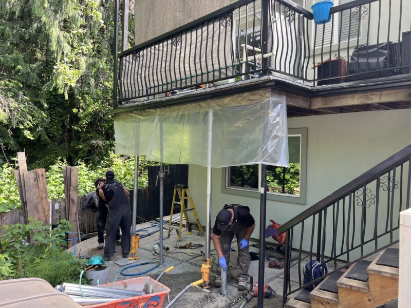 Before deck repair, the crew is prepping the job site