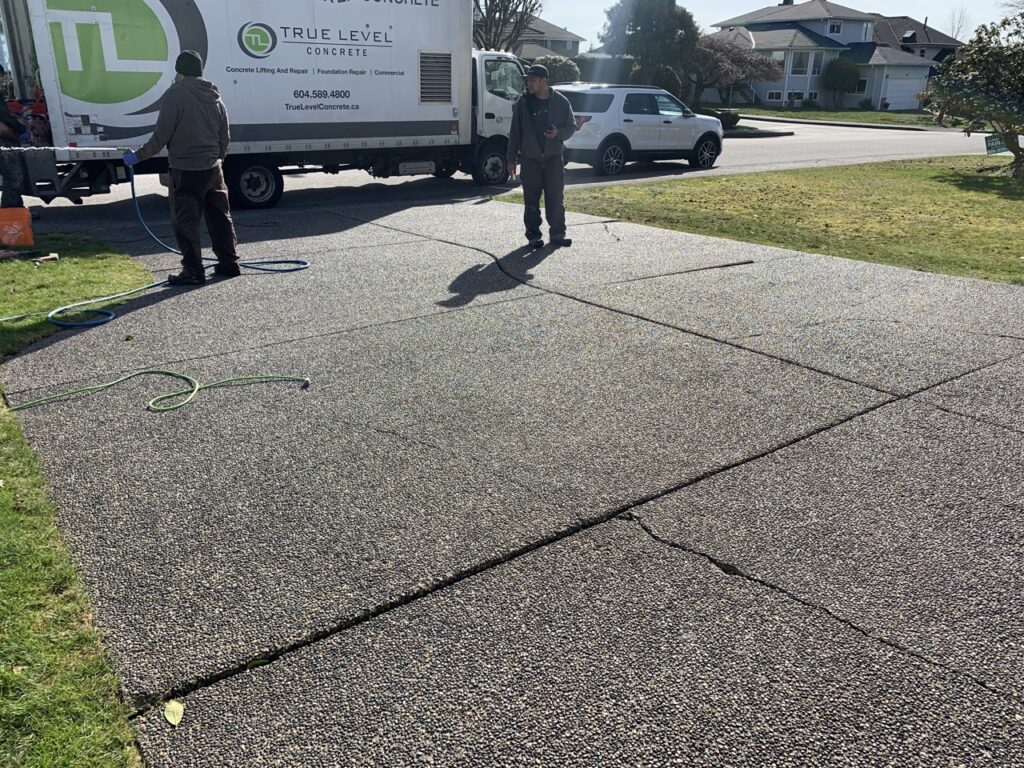 sunken cracked driveway