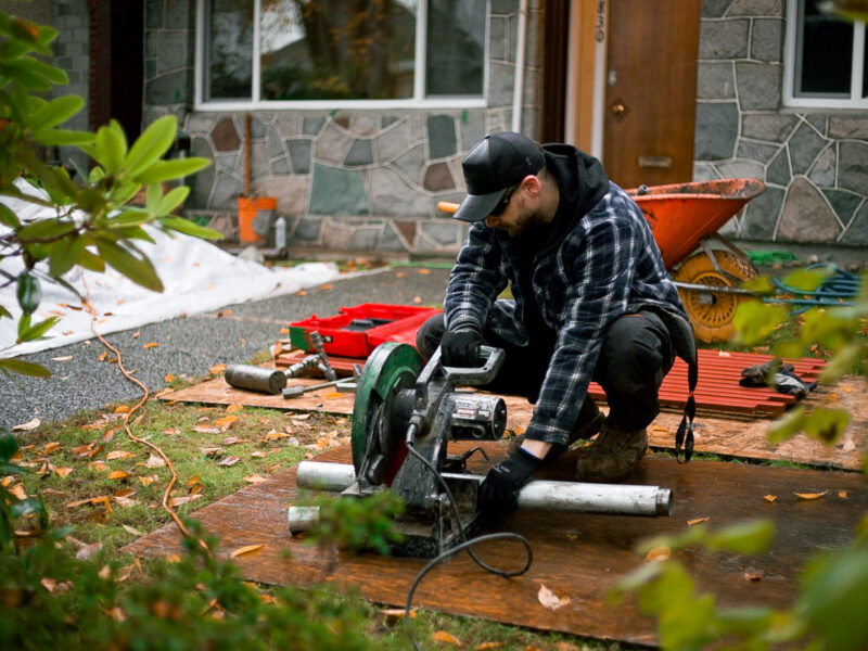 crew member cutting a steel pier