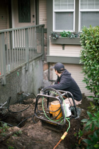 installing push piers lifting a concrete front porch maple ridge