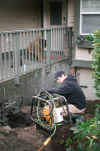 push piers lifting a concrete front porch